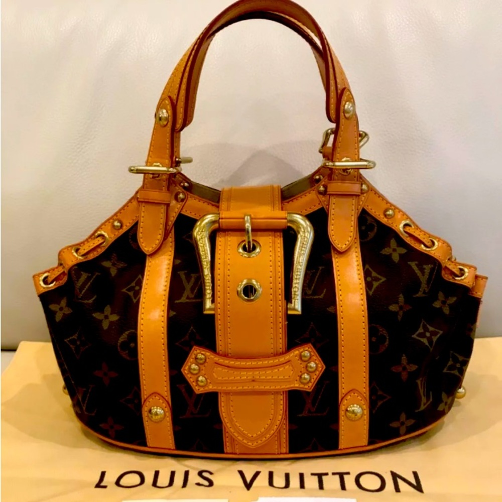 Authentic Louis Vuitton Theda GM bag excellent condition